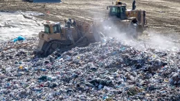 Trash is flattened and spread out across a hilllside before being covered with dirt at the Prima Deshecha landfill in San Juan Capistrano, California on Thursday, March 10, 2022. (Photo: Mark Rightmire/MediaNews Group/Orange County Register via Getty Images)